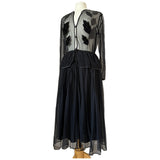 Spellbinding 1980s vintage whimsigoth black peplum midi dress by Frank Usher