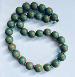 Sea green hippy vintage 1970s wooden beaded necklace