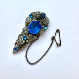 Art deco Czech glass filigree dress clip with sapphire-blue glass stones
