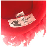 Bright red felt vintage 1980s hat with feathered plume