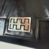 Black patent 1960s mod vintage handbag with abstract buckle detail