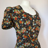 Autumn flowers vintage 1970s puff sleeved floral tea dress