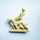 Art deco 1930s/40s celluloid lady walking dogs brooch