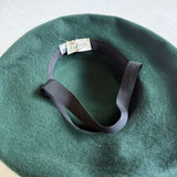1940s forest green felt tilt hat with black feather trim