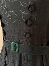 Vintage late 1930s black rayon jacquard day dress with art deco details