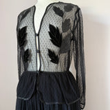 Spellbinding 1980s vintage whimsigoth black peplum midi dress by Frank Usher