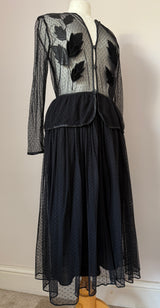 Spellbinding 1980s vintage whimsigoth black peplum midi dress by Frank Usher