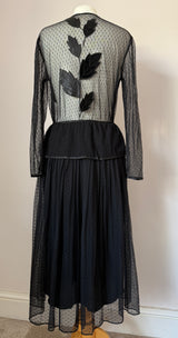 Spellbinding 1980s vintage whimsigoth black peplum midi dress by Frank Usher