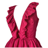 Hot pink vintage 1980s ra-ra dress with plunging neckline